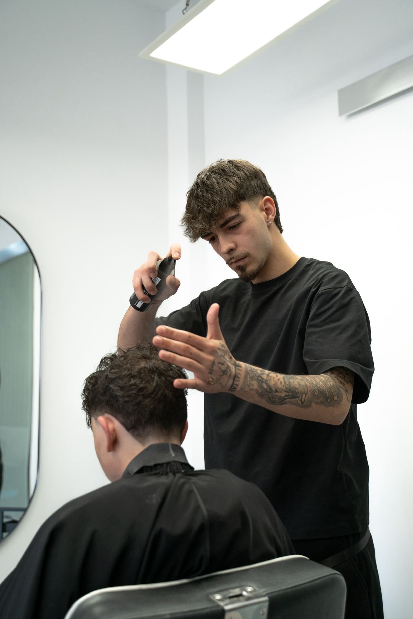 Adrian — barbero en Santos Professionals